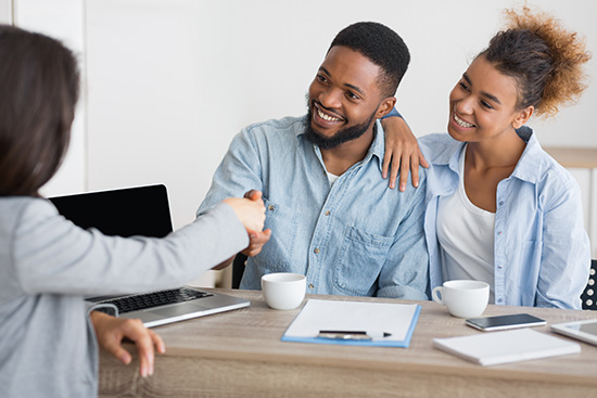 Couple getting essential insurance coverage